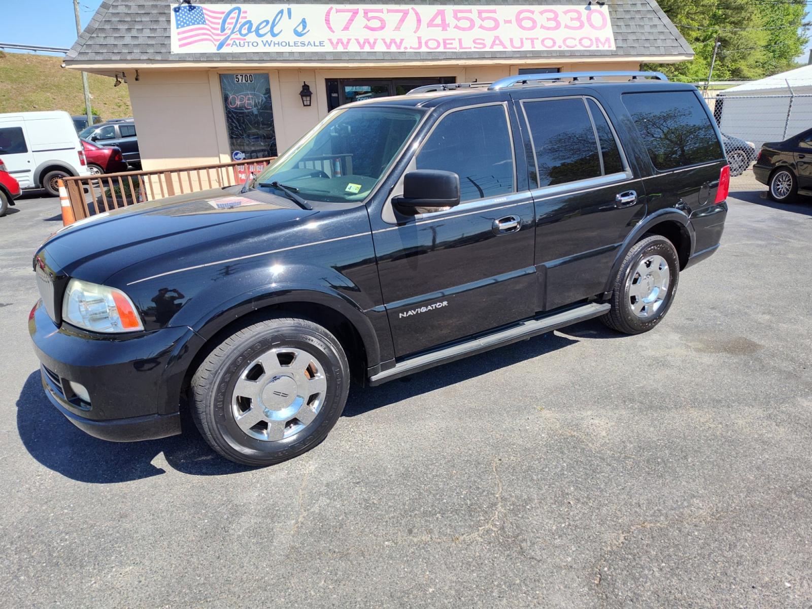 2006 Black /tan Lincoln Navigator 4WD Luxury (5LMFU28546L) with an 5.4L V8 SOHC 24V engine, 6-Speed Automatic Overdrive transmission, located at 5700 Curlew Drive, Norfolk, VA, 23502, (757) 455-6330, 36.841885, -76.209412 - Photo #0